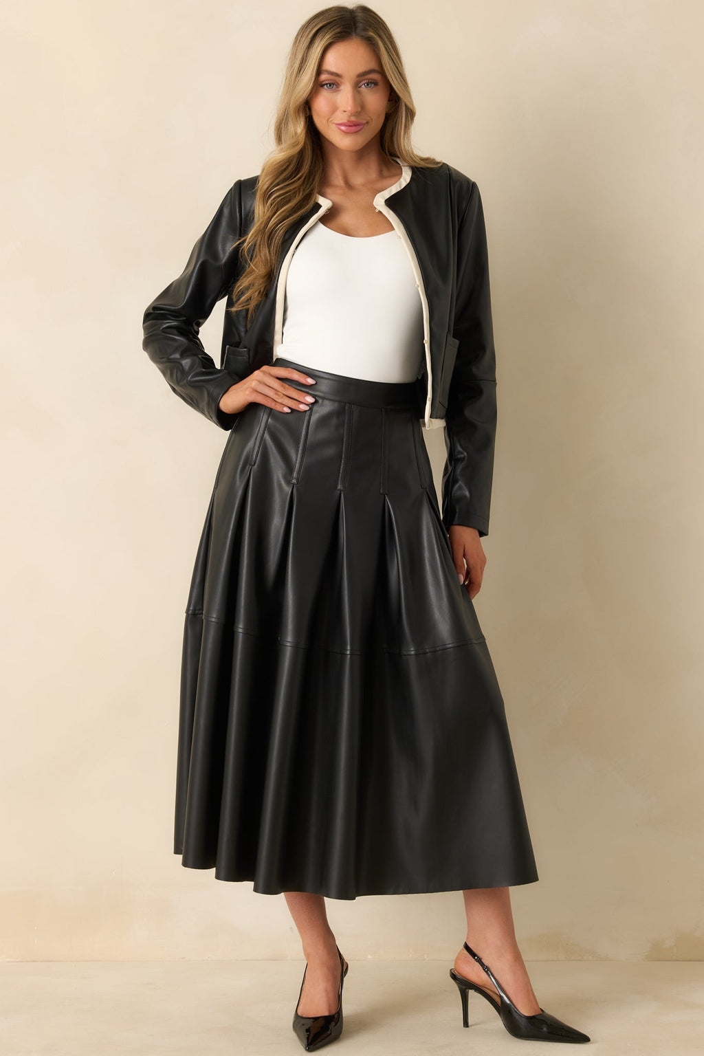 Cut To Perfection Black Faux Leather Pleated Midi Skirt
